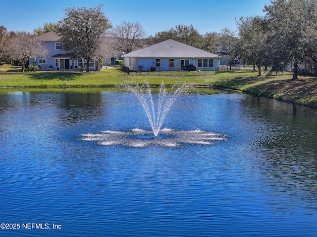 view of water feature featuring fence