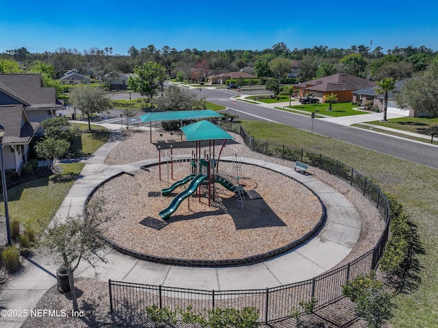 birds eye view of property with a residential view