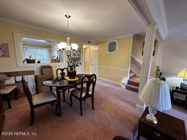 dining room with carpet flooring, a textured ceiling, stairs, and crown molding