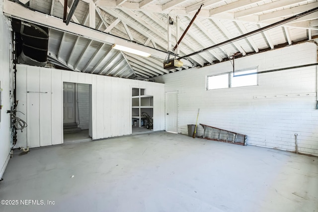 garage featuring a garage door opener