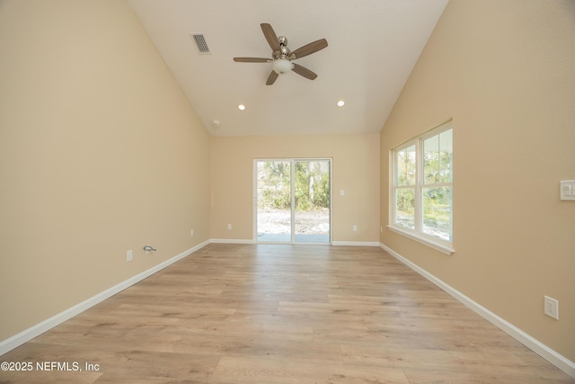 unfurnished room featuring visible vents, baseboards, recessed lighting, light wood-style flooring, and high vaulted ceiling