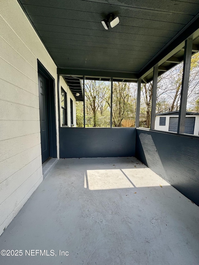 view of patio / terrace with a carport