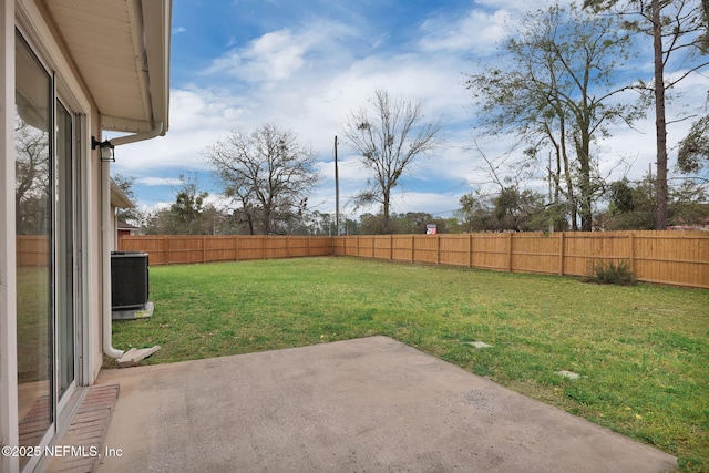 view of yard with cooling unit, a patio area, and a fenced backyard