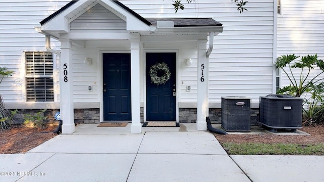 property entrance featuring cooling unit