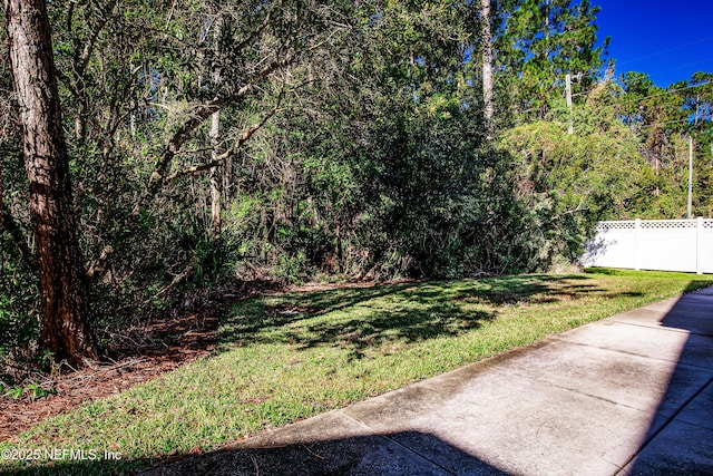 view of yard featuring fence