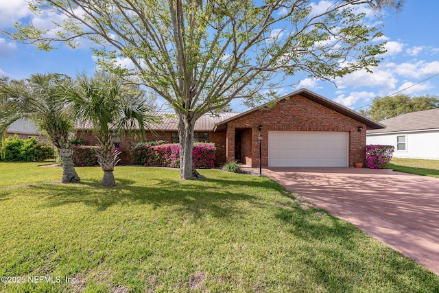 ranch-style house featuring a garage, a front yard, brick siding, and driveway