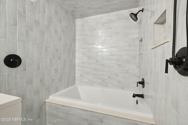 full bathroom featuring tiled shower / bath combo