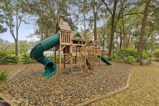 view of jungle gym with fence