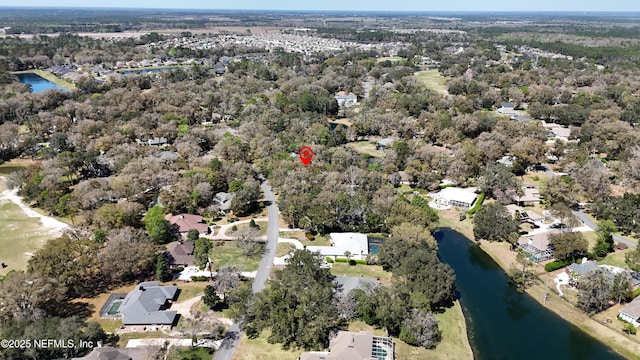 birds eye view of property featuring a residential view and a water view