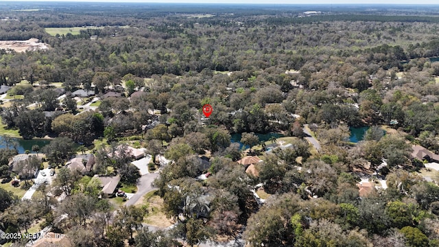 aerial view featuring a forest view