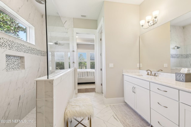 83 Village Grande Dr, Ponte Vedra, FL 32081 - bathroom featuring plenty of natural light, marble finish floor, a walk in shower, and ensuite bath
