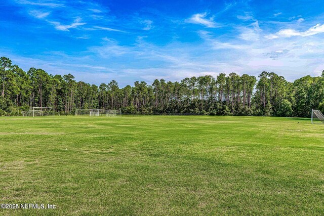 83 Village Grande Dr, Ponte Vedra, FL 32081 - view of yard featuring a wooded view