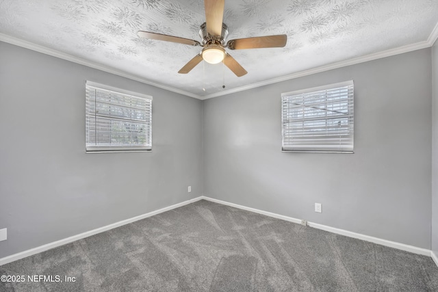 unfurnished room with crown molding, baseboards, carpet floors, and a textured ceiling