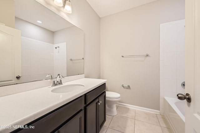 full bathroom featuring tile patterned flooring, toilet, vanity, baseboards, and tub / shower combination