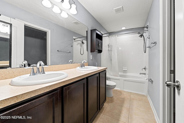 full bathroom featuring a sink, shower / bath combination with curtain, a textured ceiling, tile patterned floors, and toilet