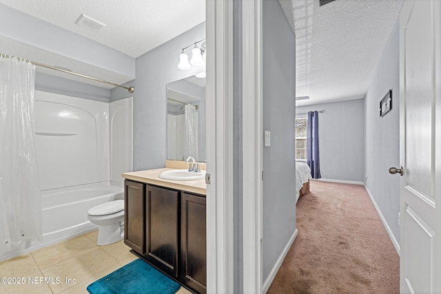 full bathroom featuring toilet, a textured ceiling, shower / tub combo, tile patterned flooring, and vanity