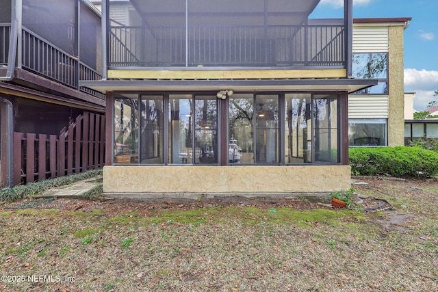 5400 La Moya Ave Unit 16, Jacksonville, FL 32210 - back of house featuring a sunroom