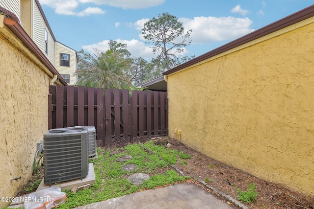 5400 La Moya Ave Unit 16, Jacksonville, FL 32210 - view of yard with central AC unit and fence