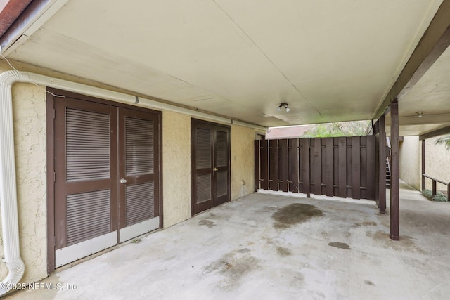 5400 La Moya Ave Unit 16, Jacksonville, FL 32210 - view of patio / terrace with french doors and fence