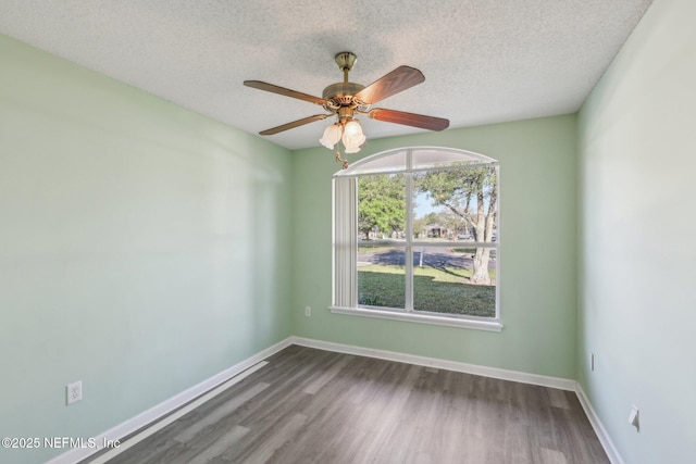 2721 Ridge Haven Dr, Green Cove Springs, FL 32043 - spare room featuring baseboards, wood finished floors, ceiling fan, and a textured ceiling
