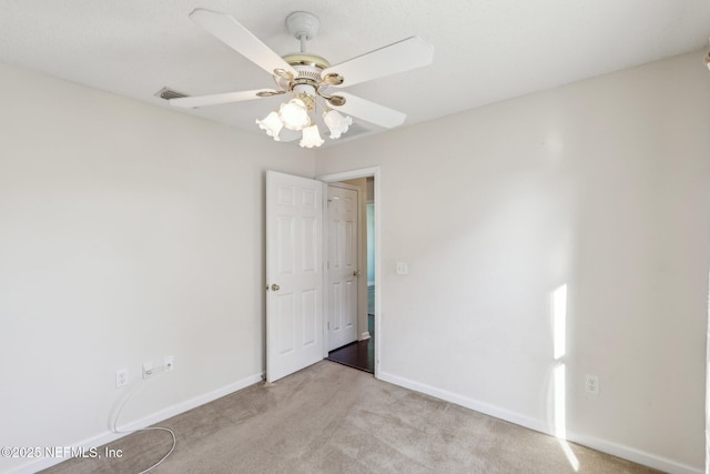 2721 Ridge Haven Dr, Green Cove Springs, FL 32043 - empty room with baseboards, ceiling fan, visible vents, and carpet