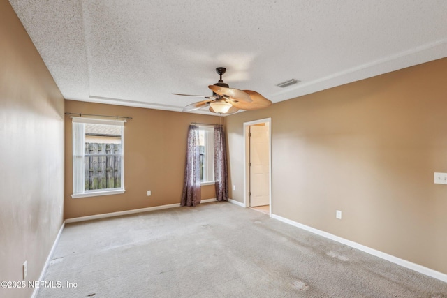 2721 Ridge Haven Dr, Green Cove Springs, FL 32043 - carpeted spare room with a ceiling fan, plenty of natural light, baseboards, and visible vents