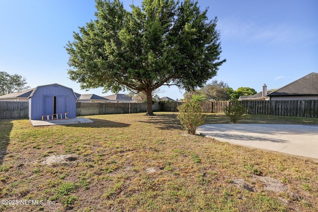 2721 Ridge Haven Dr, Green Cove Springs, FL 32043 - view of yard with an outbuilding, a fenced backyard, and a patio area