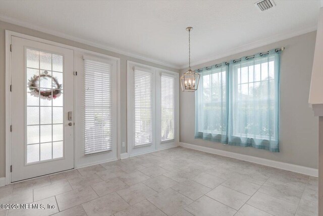 unfurnished dining area with an inviting chandelier, baseboards, visible vents, and ornamental molding