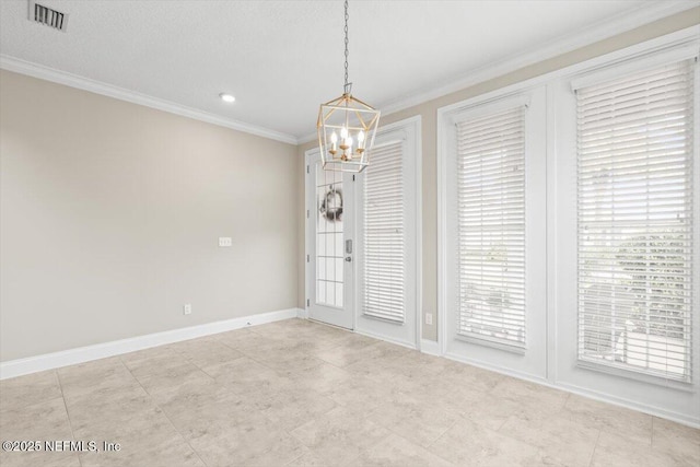 unfurnished dining area with a notable chandelier, baseboards, visible vents, and ornamental molding