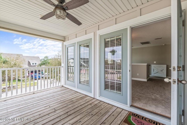 deck featuring a ceiling fan