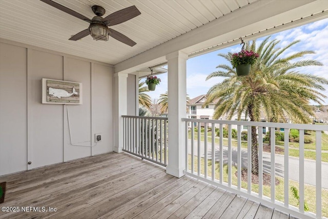 exterior space featuring a ceiling fan