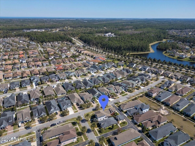 aerial view with a residential view and a water view