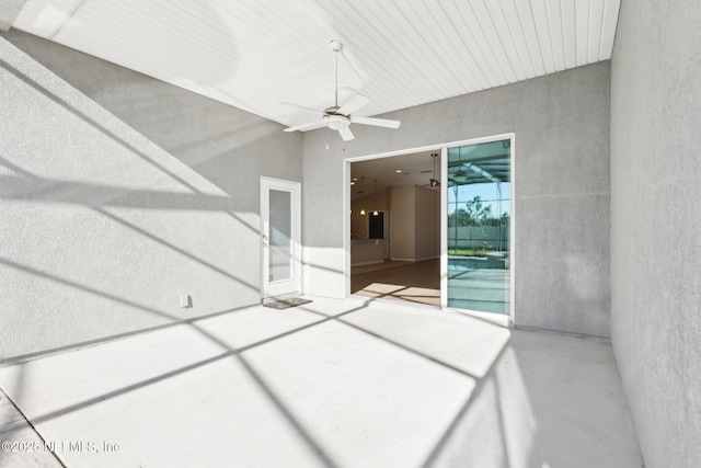 view of patio / terrace featuring ceiling fan