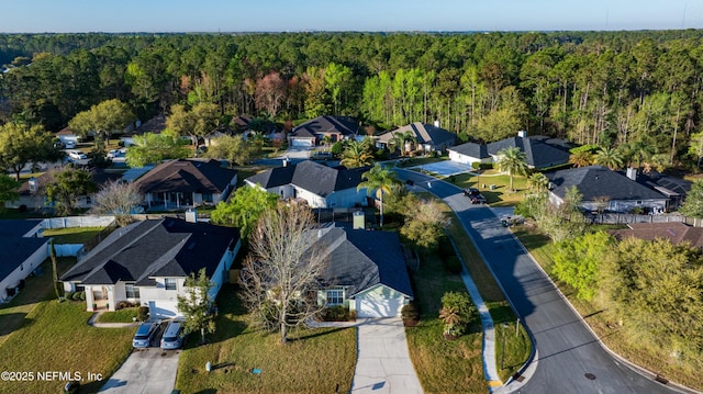 bird's eye view with a residential view and a forest view