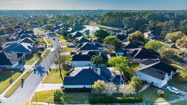 aerial view featuring a residential view and a water view