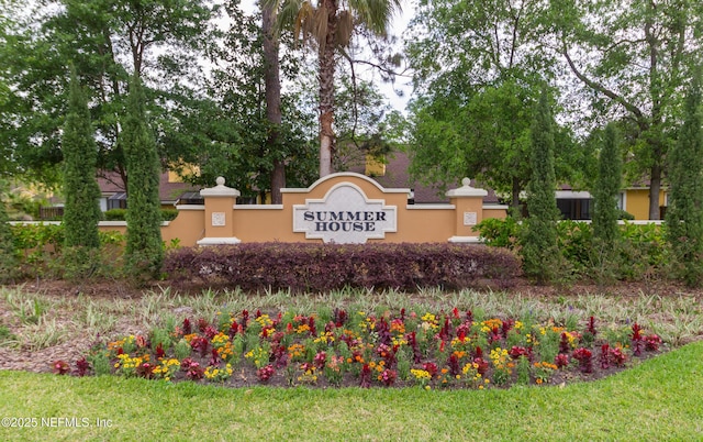 view of community sign