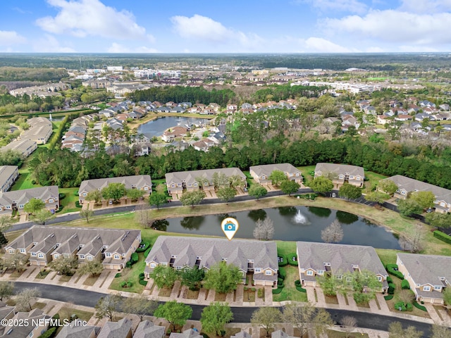 aerial view featuring a residential view and a water view