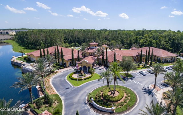 birds eye view of property featuring a residential view and a water view