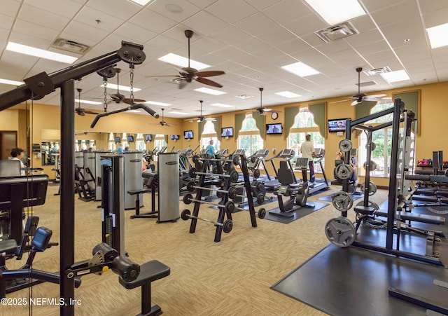 workout area with visible vents and carpet