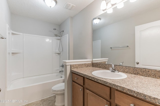 bathroom featuring visible vents, toilet, a textured ceiling, tile patterned flooring, and vanity