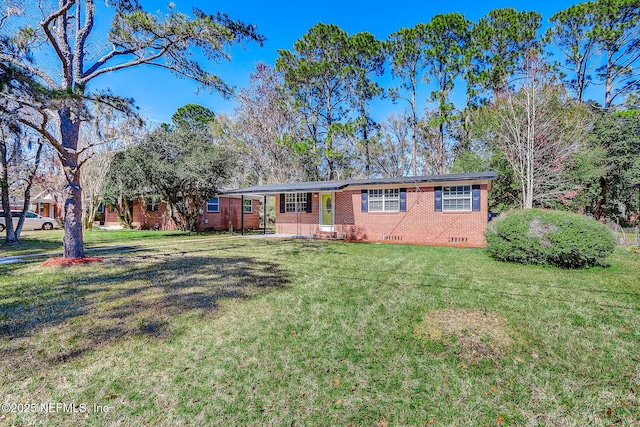 ranch-style home with a front yard, brick siding, and crawl space