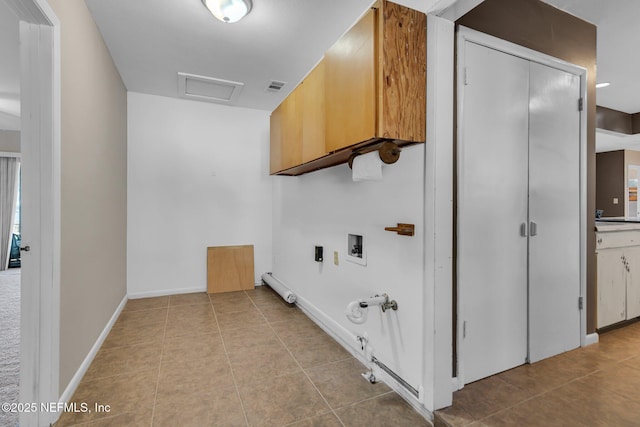 laundry area featuring hookup for a washing machine, tile patterned floors, visible vents, and gas dryer hookup