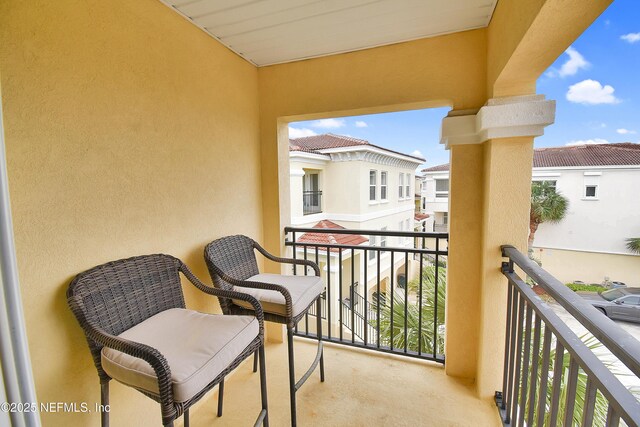 balcony featuring a residential view