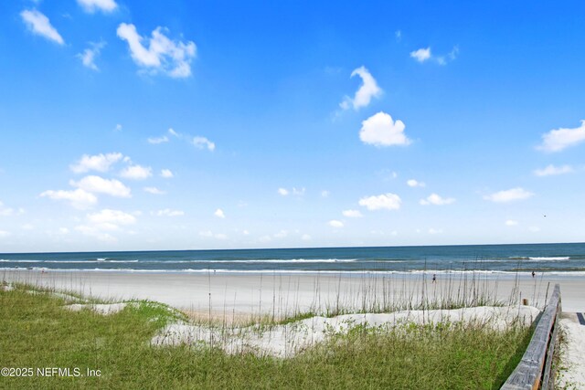 property view of water featuring a beach view