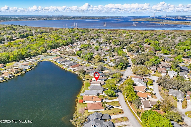 aerial view featuring a residential view and a water view