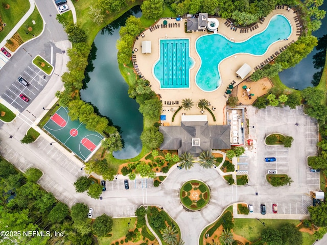 bird's eye view with a water view