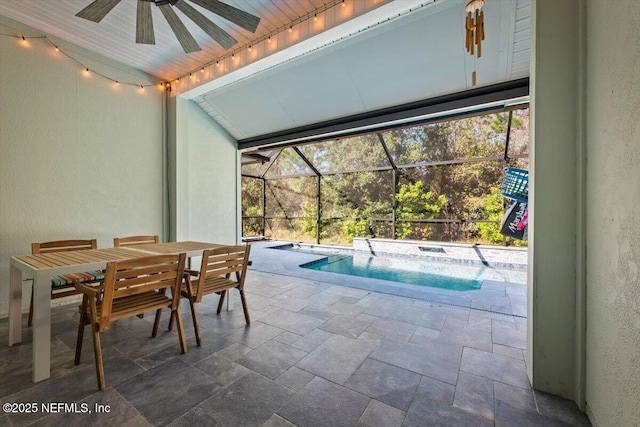 outdoor pool with a lanai, a patio, outdoor dining area, and ceiling fan