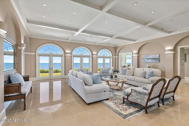 living area with beam ceiling, coffered ceiling, french doors, a high ceiling, and baseboards