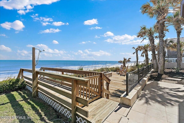 view of community featuring a water view and a view of the beach