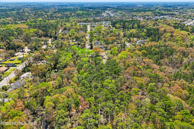 bird's eye view featuring a view of trees